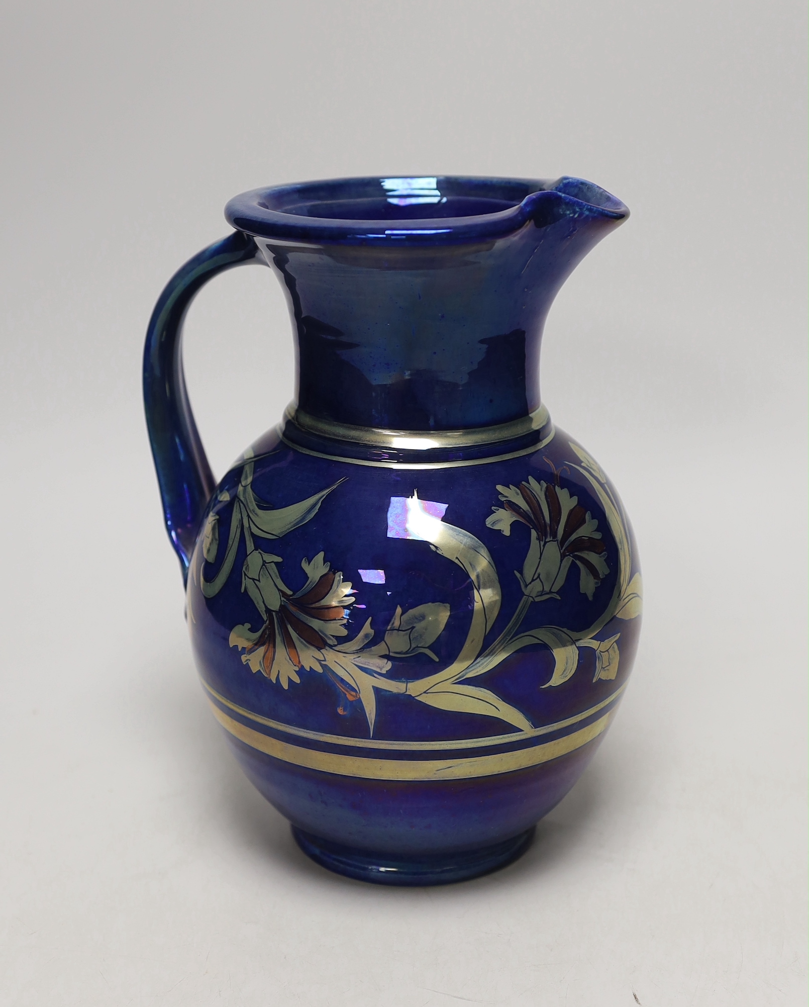 Jonathan Chiswell Jones - a ‘chrysanthemum’ pattern lustre jug, No. 7794, 23cm